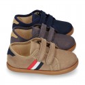 New autumn winter canvas tennis style shoes with flag detail and VELCRO strap.