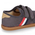 New autumn winter canvas tennis style shoes with flag detail and VELCRO strap.