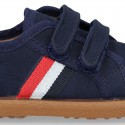 New autumn winter canvas tennis style shoes with flag detail and VELCRO strap.