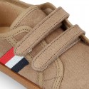 New autumn winter canvas tennis style shoes with flag detail and VELCRO strap.