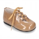 Patent leather little kids English style shoes in autumn colors.