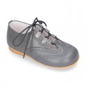 Nappa leather Stylized classic english style shoes with shoelaces closure.