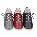 Nappa leather Stylized classic english style shoes with shoelaces closure.