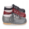 Nappa leather Stylized classic english style shoes with shoelaces closure.