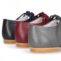 Nappa leather Stylized classic english style shoes with shoelaces closure.