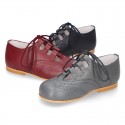 Nappa leather Stylized classic english style shoes with shoelaces closure.