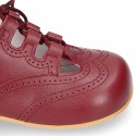 Nappa leather Stylized classic english style shoes with shoelaces closure.