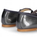 METAL patent leather classic Mary Jane shoes with velcro strap and button.