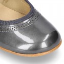 METAL patent leather classic Mary Jane shoes with velcro strap and button.