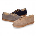 Suede leather kids Laces up style shoes with perforated design.