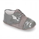 Combined leather little oxford shoes for babies with silk ties closure design.