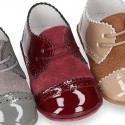 Combined leather little oxford shoes for babies with silk ties closure design.