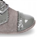 Combined leather little oxford shoes for babies with silk ties closure design.