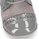 Combined leather little oxford shoes for babies with silk ties closure design.