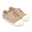 New kids suede leather Tennis type shoes with TOE CAP.