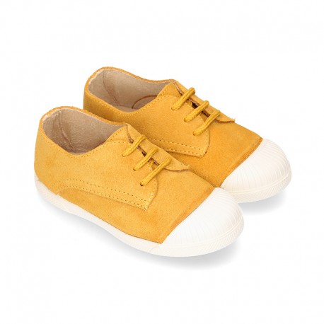 New kids MUSTARD suede leather Tennis type shoes with toe cap.