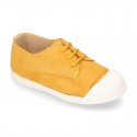 New kids MUSTARD suede leather Tennis type shoes with toe cap.