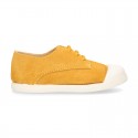 New kids MUSTARD suede leather Tennis type shoes with toe cap.