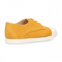 New kids MUSTARD suede leather Tennis type shoes with toe cap.