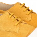 New kids MUSTARD suede leather Tennis type shoes with toe cap.