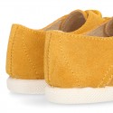 New kids MUSTARD suede leather Tennis type shoes with toe cap.