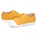 New kids MUSTARD suede leather Tennis type shoes with toe cap.