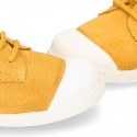 New kids MUSTARD suede leather Tennis type shoes with toe cap.