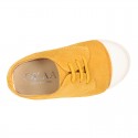 New kids MUSTARD suede leather Tennis type shoes with toe cap.