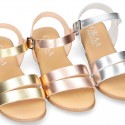 Metal finish leather sandal shoes with buckle fastening.