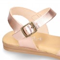 Metal finish leather sandal shoes with buckle fastening.