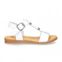 Combined leather sandals with patent and metal details finish.