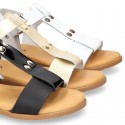 Combined leather sandals with patent and metal details finish.