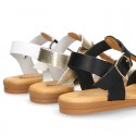 Combined leather sandals with patent and metal details finish.