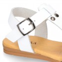 Combined leather sandals with patent and metal details finish.