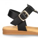 Combined leather sandals with patent and metal details finish.