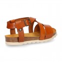 Soft Cowhide sandal shoes with white soles.