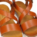 Soft Cowhide sandal shoes with white soles.