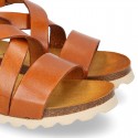 Soft Cowhide sandal shoes with white soles.