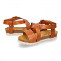 Soft Cowhide sandal shoes with white soles.