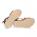 Soft Cowhide sandal shoes with white soles.