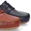 Classic Tanned leather Moccasin shoes with detail mask.