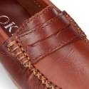 Classic Tanned leather Moccasin shoes with detail mask.