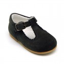 Classic Suede leather T-strap shoes with scallop and buckle fastening.