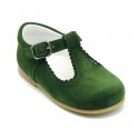 Classic Suede leather T-strap shoes with scallop and buckle fastening.