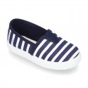 Cotton cavas Sneaker or bamba style shoes with stripes design.