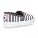 Cotton cavas Sneaker or bamba style shoes with stripes design.