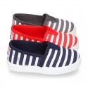 Cotton cavas Sneaker or bamba style shoes with stripes design.