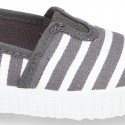 Cotton cavas Sneaker or bamba style shoes with stripes design.