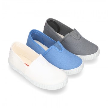 Cotton canvas Bamba type shoes with elastic band.