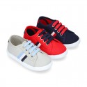 New cotton canvas tennis shoes with flag detail.